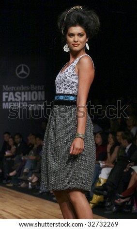 MEXICO CITY - MAY 20: A model walks the runway wearing Lydia Lavin Autumn/Winter 2009 during Mercedes-Benz Fashion Mexico Autum/Winter 2009 May 20, 2009 in Mexico City.