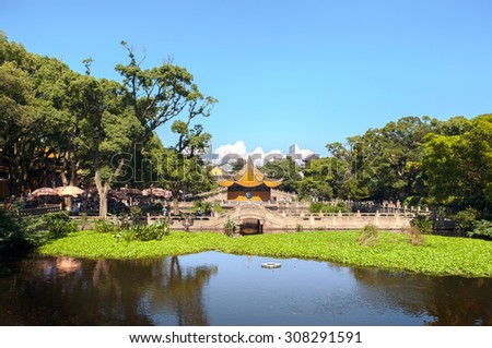 Pond and pavilion outside Puji Temple on the Buddhist island of Putuoshan, China