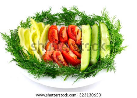 Sliced fresh tomato, cucumber, pepper dill isolated on white background