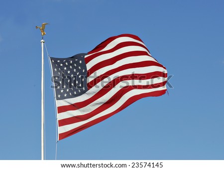 American flag flying in a strong wind