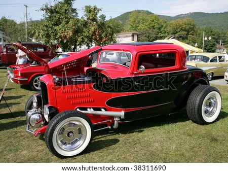 LAKE GEORGE, NY - SEPT 12: A \'32 Ford coupe award winner being shown off at the 21st Annual Adirondack Nationals on September 12, 2009 in Lake George, NY