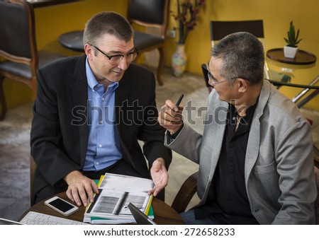 Two business people talking on meeting