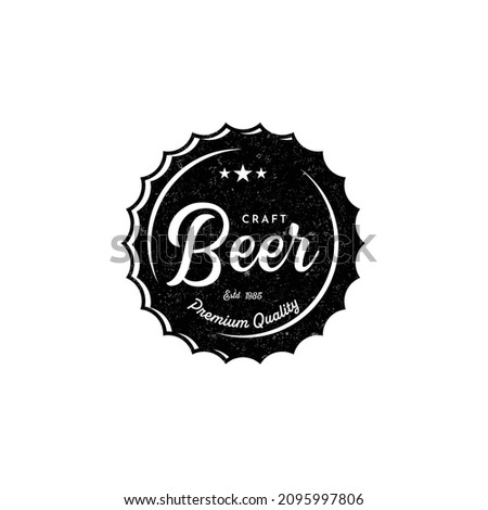 Vintage craft beer logo with inscription on bottle cap isolated vector illustration