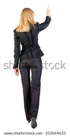 Back View Of Walking Business Woman. Pointing Young Girl In Black Suit ...