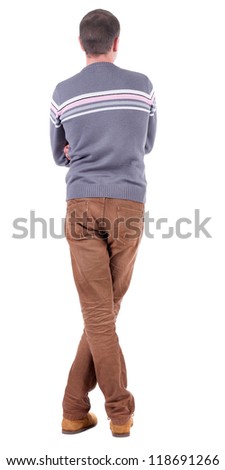 Back View Of Handsome Man In Sweater And Jeans Looking Up. Standing ...