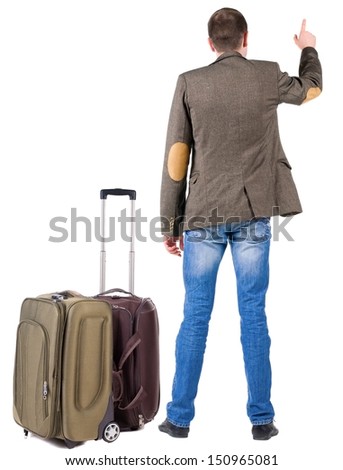 Back view of traveling business man with  suitcase pointing. Rear view people collection.  backside view of person.  Isolated over white background.