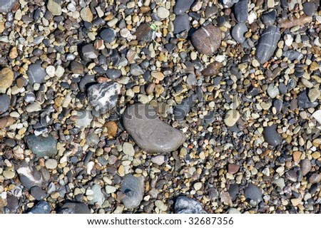 abstract background with round peeble stones. Close up.