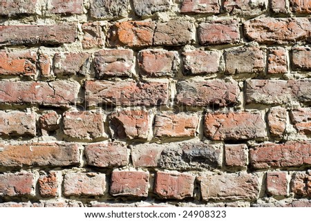 Rough red bricks and mortar