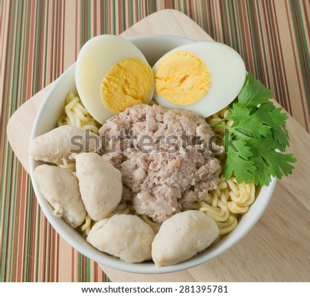 Cuisine and Food, Top View of Asian Instant Noodles with Pork, Meat Ball and Boiled Egg in White Bowl.