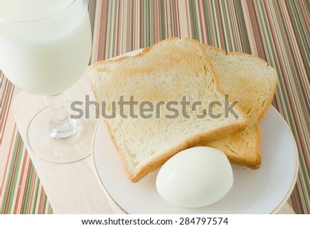 Cuisine and Food, Homemade Brown Toast with Boiled Eggs and Milk for Breakfast.