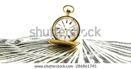 Antique gold watch on a stack of money dollars isolated on white