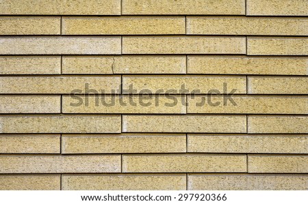 Texture of sandy decorative tiles in form of brick