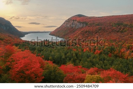 Similar – Foto Bild Ruhiger See und Stadt in der Nähe der Berge