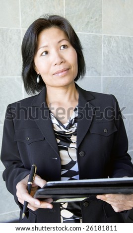 Businesswoman with paperwork
