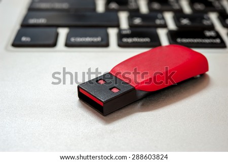 flash and laptop keyboard closeup