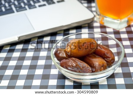 Dates fruit, snack at work concept.