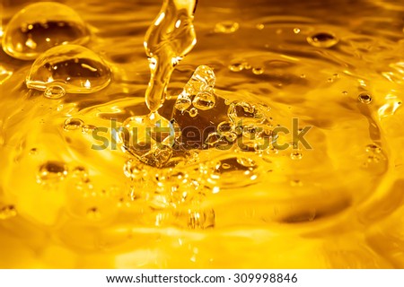 Photo of a drop of water on a orange background