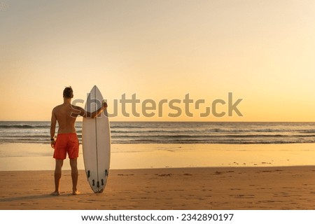 Similar – Image, Stock Photo Man standing on seaside and contemplating moment