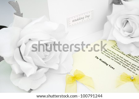 wedding day congratulation cards on a wedding vows sheet.