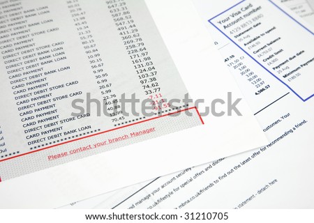 Bank statement and credit card statement showing account in the red