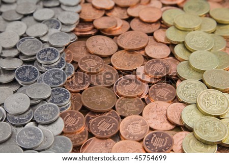A pile of Bank of england Five pence,one pence,two pence and one pound coins