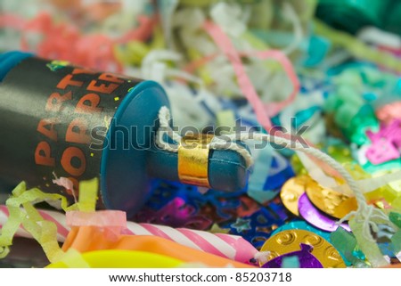 Close up shot of a Party Popper and party confetti
