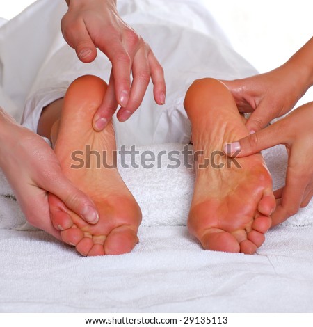 Four hands do massage to two female feet please see some of my other parts of a body images: