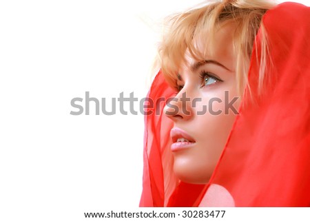 Beautiful blonde with a red scarf on a head, isolated on a white background