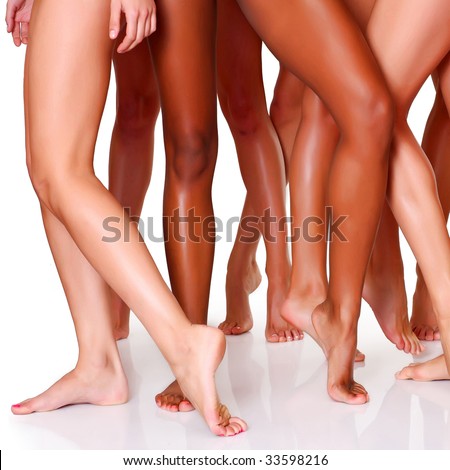 Beautiful female slim feet of group of girls