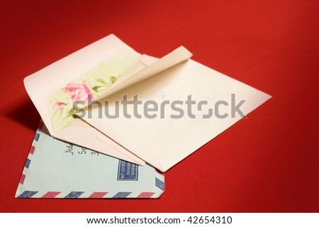 Empty opened  envelopes on red backgrounds