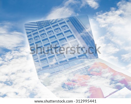 double exposure hand on notebook and building screen on blue sky