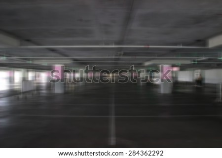 a blur photo of the empty parking lot in one shopping center in Thailand
