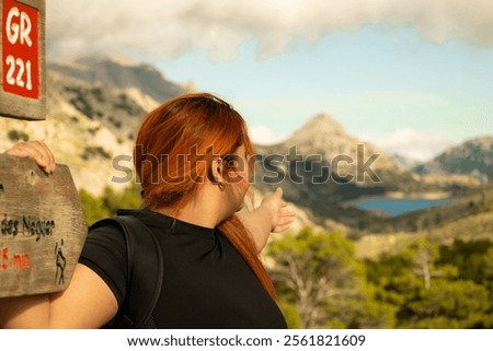 Similar – Image, Stock Photo Sportswoman looking lake from pier