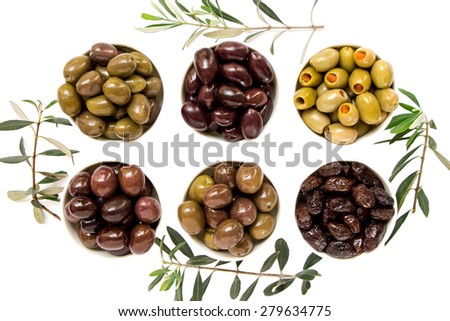 Similar – Image, Stock Photo Olives. A variety of green, black and red olives, with leaves, shot from the top with a place for text