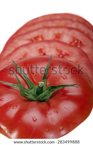 Red tomato slices isolated on white background