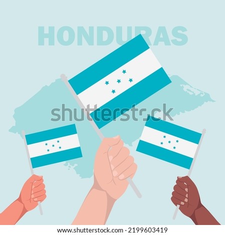 Group of people holding Honduras Flags. Independence day celebration concept. Diverse people celebrating independence with their hands up raising flags.