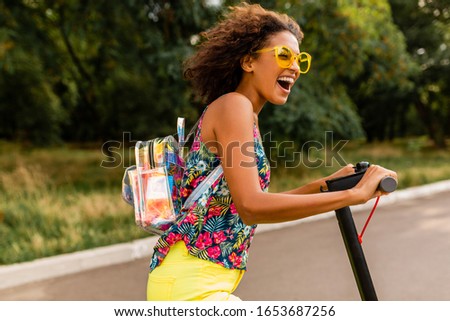 Image, Stock Photo Woman on electric kick scooter