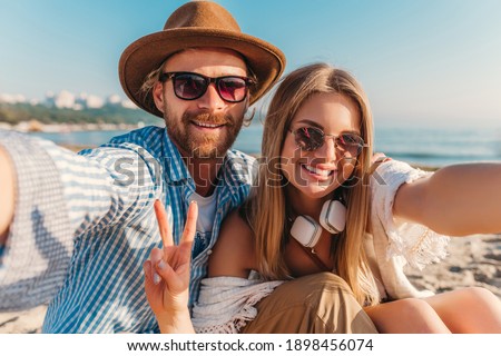 Similar – Image, Stock Photo Photo of lovely young woman has smooth healthy skin after beauty procedures and receiving facial massage, stands bare shoulders, has long dark straight hair, isolated over beige wall cares of her body