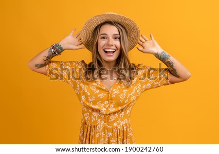 Similar – Image, Stock Photo Young woman in hat standing in garden