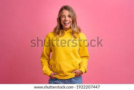 Similar – Image, Stock Photo Woman in yellow hoodie taking selfie on smartphone on rocky shore