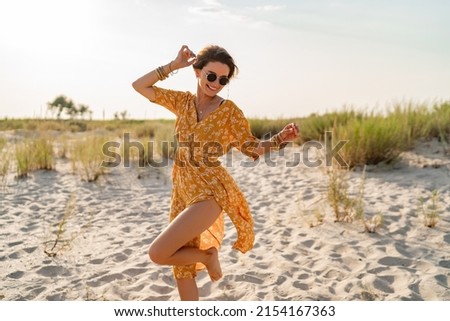 Similar – Image, Stock Photo Relaxed fashionable caucasian woman wearing red asian style kimono and traditional asian paddy hat walking amoung beautiful green rice fields and terraces on Bali island