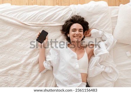 Similar – Image, Stock Photo young woman laying in bed