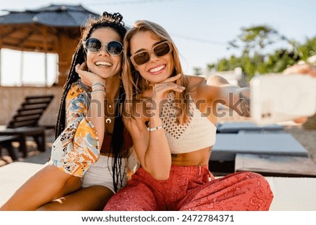 Similar – Image, Stock Photo Two fun friends on the Tibetan Bridge in Andorra.