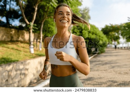 Image, Stock Photo woman running on the street in Bilbao city Spain