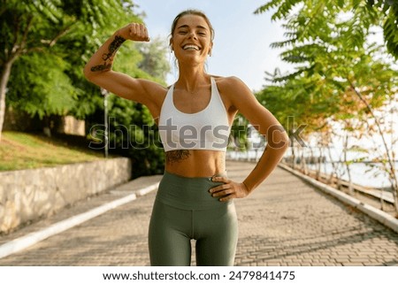 Similar – Image, Stock Photo Athlete woman doing leg stretch