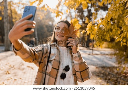 Similar – Image, Stock Photo Girl is taking a sunset photo on the mobile phone