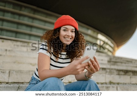 Similar – Image, Stock Photo Woman sitting on red suitcase on road