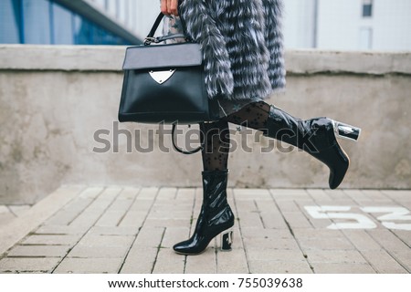 Similar – Image, Stock Photo Woman in stylish boots with red suitcase standing on road