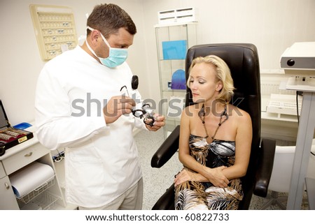 Doctor,examining a patient in ophthalmology clinic