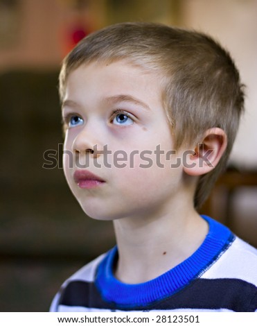 Candid Close Up Portrait Of A Cute Six Year Old Boy Looking Up Stock ...